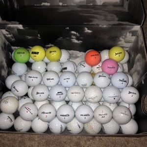 71 golf balls, ranging from maxfli to Wilson